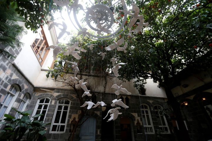 In Damascus, contemporary art installation "Once upon a time... a window"led by a plastic arts teacher and sixteen students from the School of Fine Arts (LOUAI BESHARA / AFP)