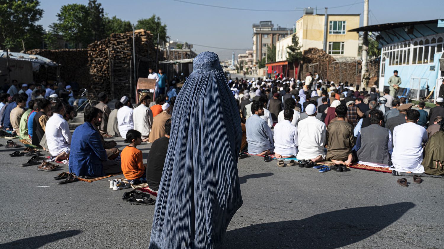 Afghanistan's supreme leader orders women to wear burkas in public
