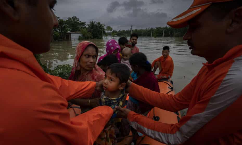 At least 25 dead and millions stranded as floods devastate India and Bangladesh |  India |  The Guardian
