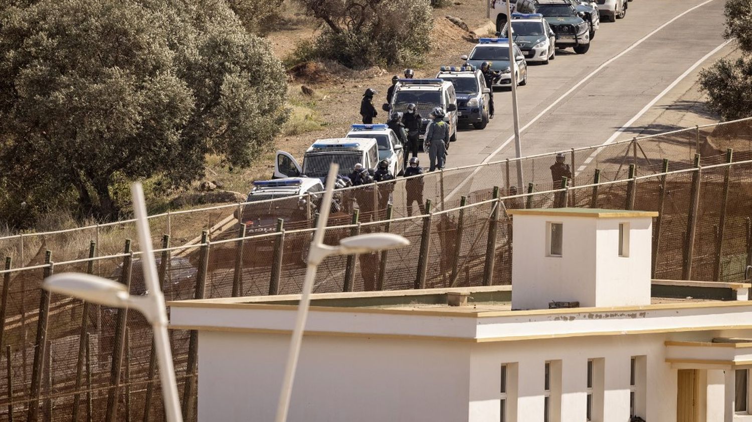 Nearly 2,000 migrants try to enter the Spanish enclave of Melilla
