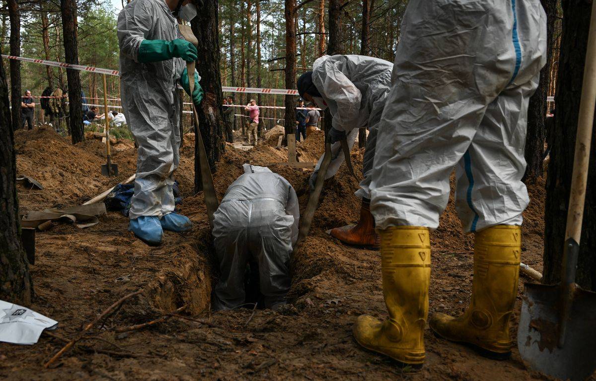 Moscow denies Izium mass graves and hits Ukraine powerhouse
