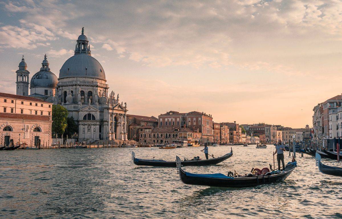 Two French tourists steal a gondola on the Grand Canal in Venice
