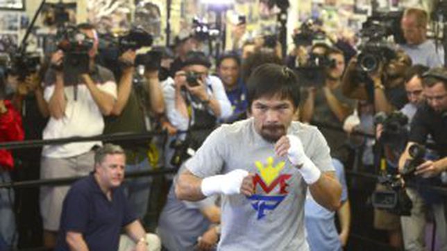 Pacquiao denies he cheated in a decisive fight in 2000
