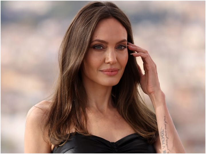 Angelina had set an example of love by writing her name in blood, then broke off at the age of three?


