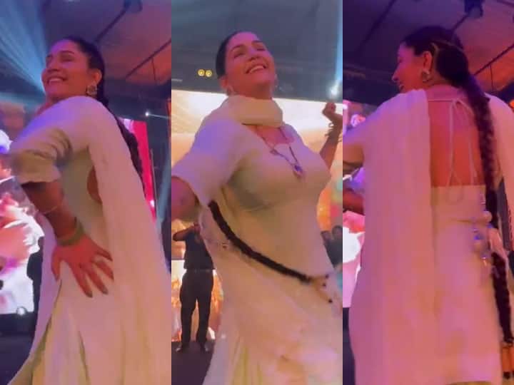 Sapna Chowdhary is dancing to the audience more than the DJ, dancing in a white kurta

