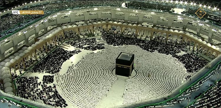 The first prayer on the third extended roof of Masjid al-Haram
