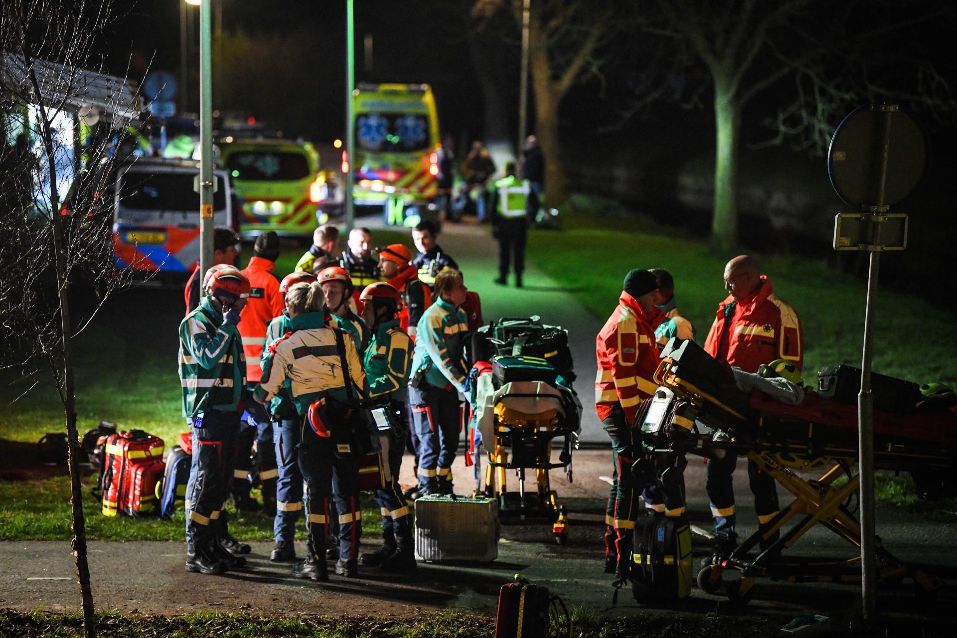 Emergency services work at the site of a train derailment in Voorschoten, the Netherlands, killing at least one person.  BLAZETRENDS/EPA/JOSH WALET ////////// Voorschoten (The Netherlands), 04/04/2023.- Emergency services work at the site of a derailed night train in Voorschoten, the Netherlands, on 04 April 2023. One person has been killed and several people seriously injured after a passenger train collided with construction equipment on the tracks.  A freight train was also involved in the accident.  (Netherlands; Holland) BLAZETRENDS/EPA/JOSH WALET
