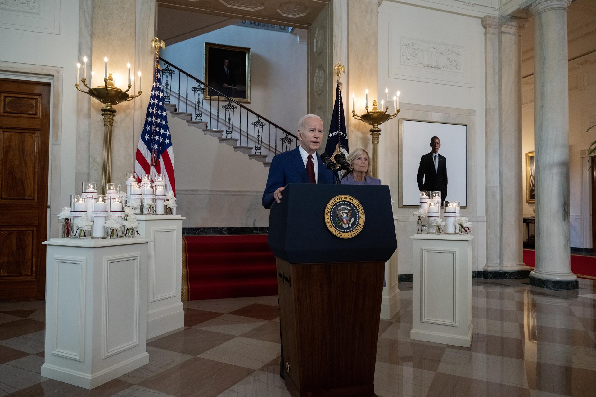 United States President Joe Biden, accompanied by First Lady Jill Biden, speaks during a tribute to the victims of the Uvalde school shooting, at the White House, in Washington (USA), on May 24, 2023. BLAZETRENDS/EPA/Ron Sachs/Pool