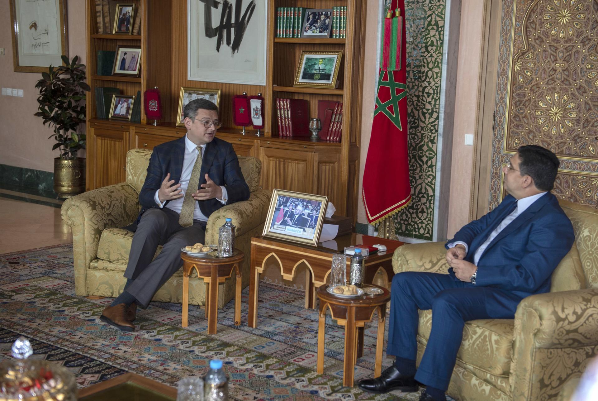 Ukraine's Foreign Minister, Dmytro Kuleba (L), and his Moroccan counterpart, Nasser Bourita (R), talk during a meeting in Rabat, Morocco, on May 22, 2023. BLAZETRENDS/EPA/JALAL MORCHIDI