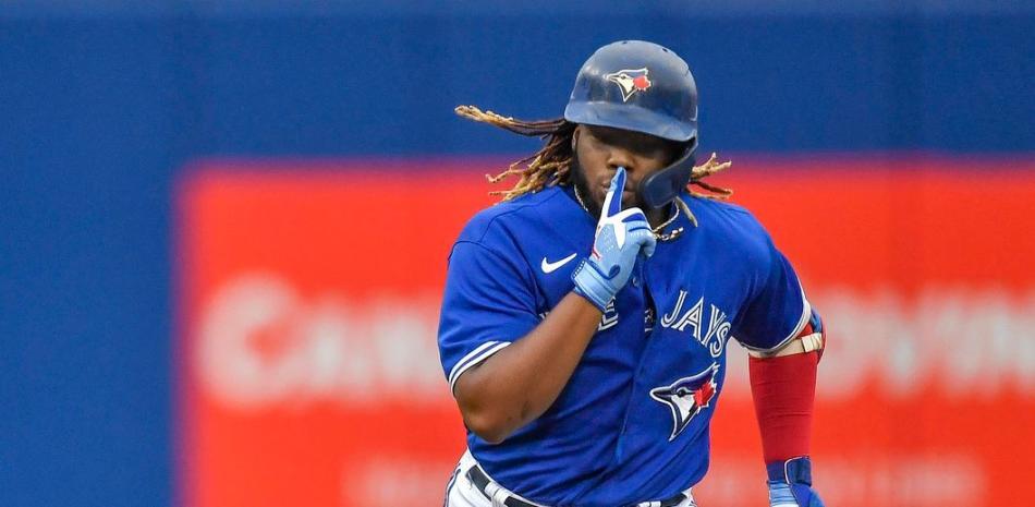 Vladdy Jr hits a grand slam in the Blue Jays' 20-1 win over the Tampa Rays
