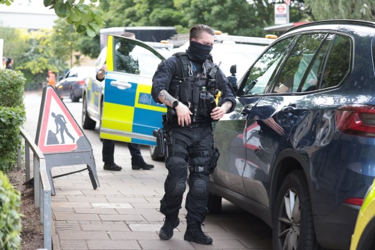 Armed police at Central Middlesex Hospital in West London.
