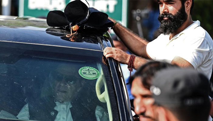 Former Prime Minister Imran Khan returning from Islamabad High Court (Photo-AFP) 