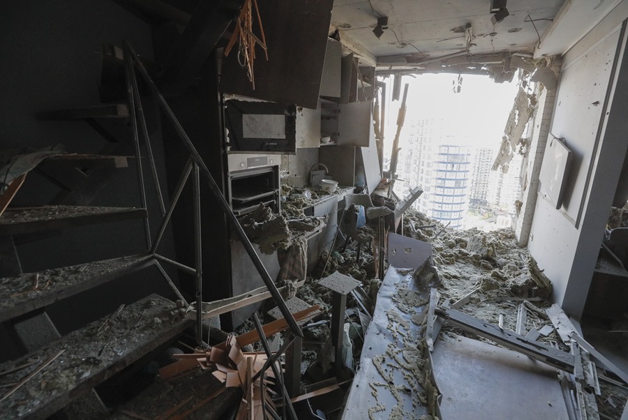 Interior view of a damaged apartment in a residential building after a nighttime drone strike in kyiv on July 13.