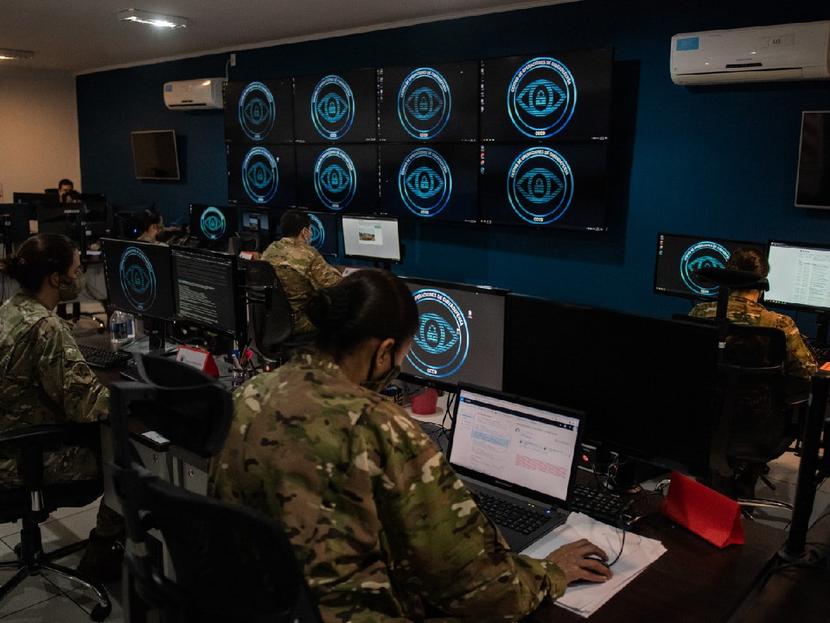 Computers facing the military.