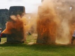 Environmentalists sprayed Stonehenge prehistoric site with orange paint


