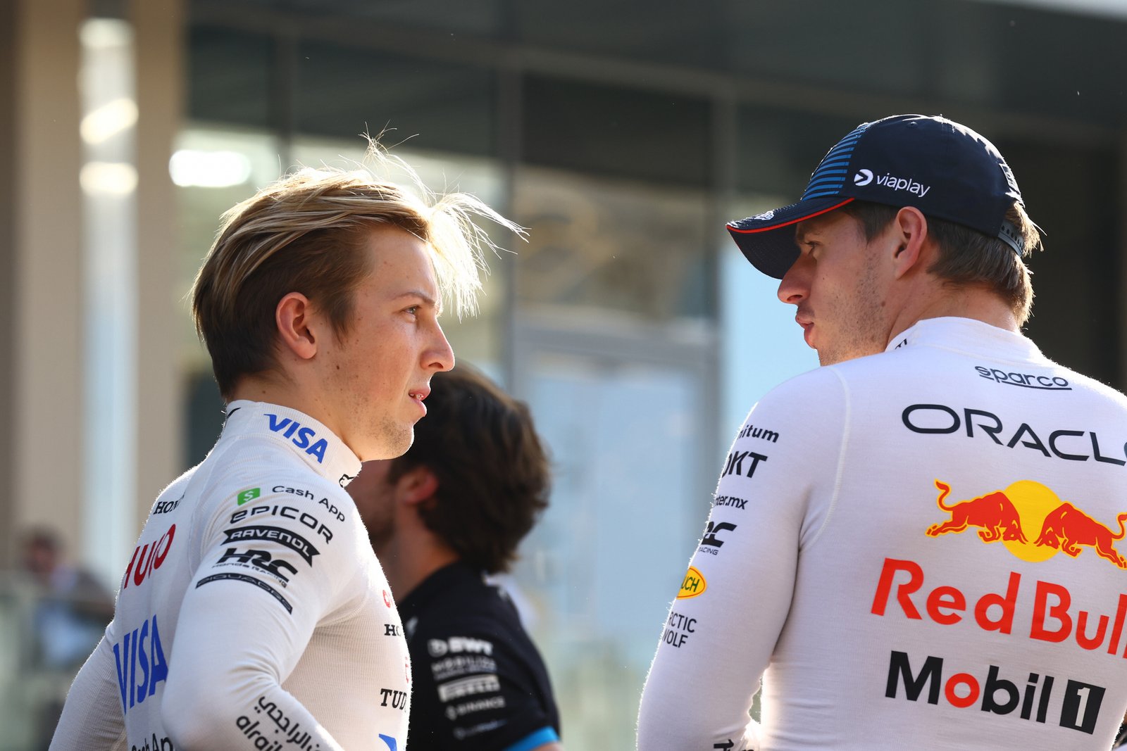 Liam Lawson and Max Verstappen speaking in Abu Dhabi