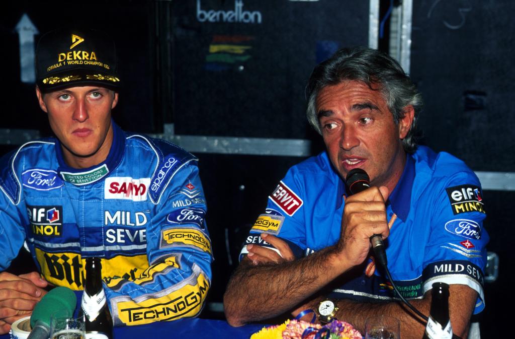 Michael Schumacher (GER), Benetton Ford B194 and Flavio Bruiatore at press conference in Australia 1994 where he collided with Damon Hill (GBR), Williams Renault FW16. The two drivers retire and the title goes to Schumacher. It was his first title Adelaide Australia November 14, 1994 - 20060911