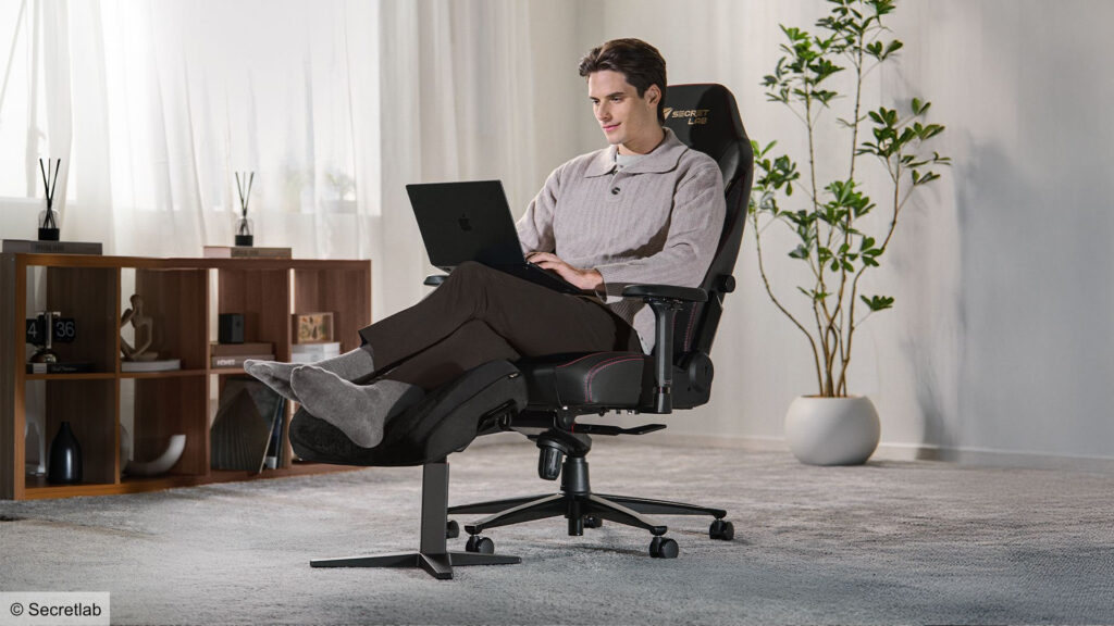 Secret Lab Launches Otto Ergonomic Footrest with Adjustable Height, Tilt, and Memory Foam. Secret Lab Otto in use with a laptop