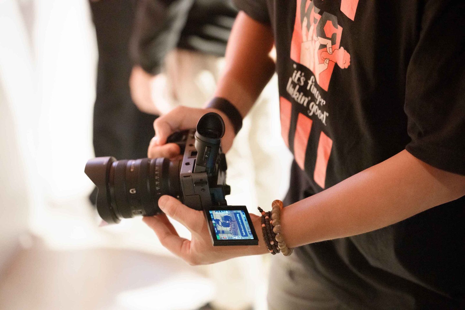 Side view of the Sony FX2 camera with an attached lens.