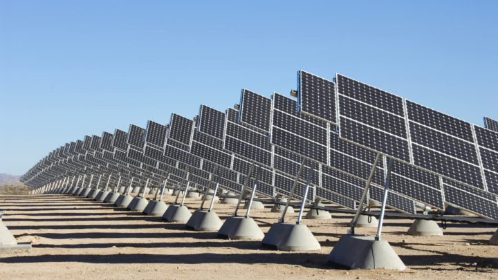 ENTSOS-E: Cascading Renewable Failures Triggered Major Iberian Blackout, Grid Collapse Solar panels and a power transmission tower.