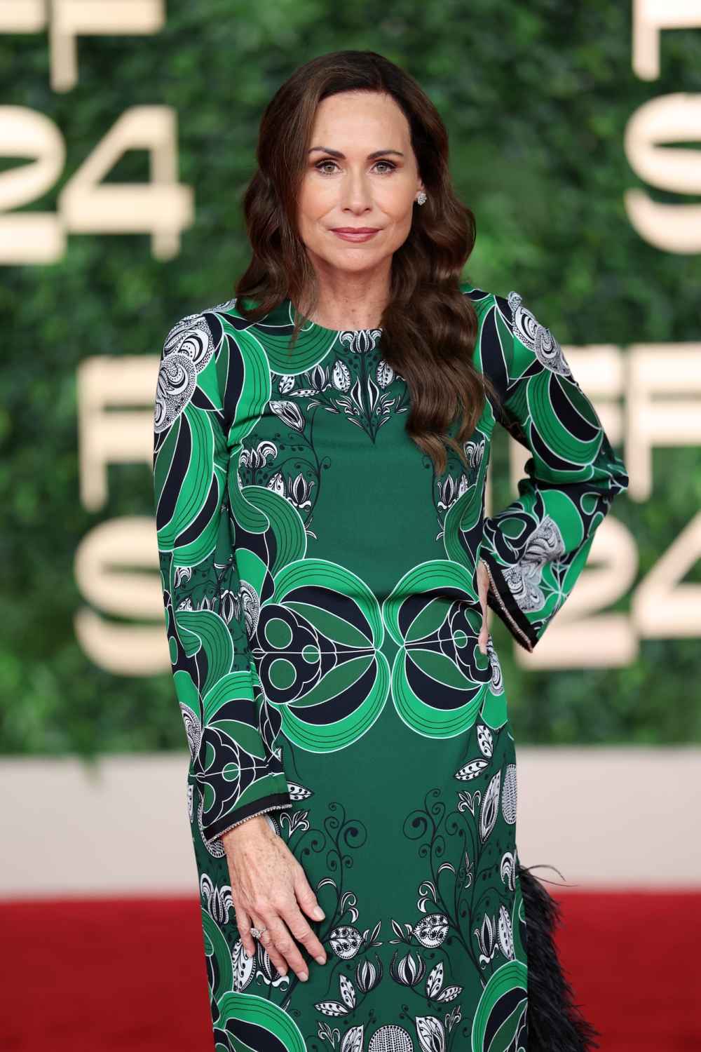 Emily in Paris Season 5: December Release, Key Cast Changes, Gabriel Love Triangle Minnie Driver smiling at an event.