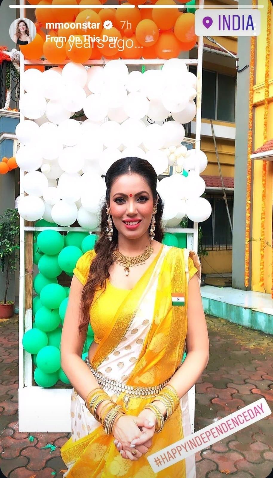 Munmun Dutta in a yellow and white saree