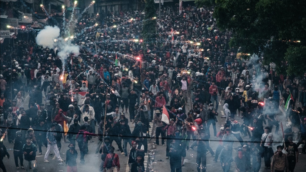 Thousands of workers protest outside the parliament building in Jakarta, calling for better wages and an end to politician privileges.