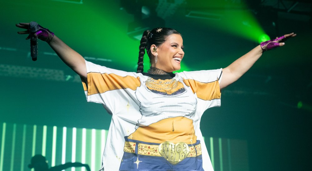 Nelly Furtado Defies Body Shamers With Better Than Ever Shirt At Manchester Pride Nelly Furtado challenges body critics with her 'Better Than Ever' t-shirt during her Manchester performance.