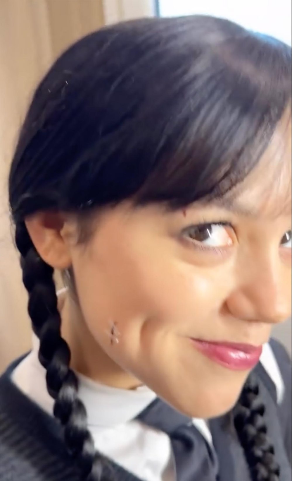 The hidden details behind Jenna Ortega's hair and makeup in Wednesday