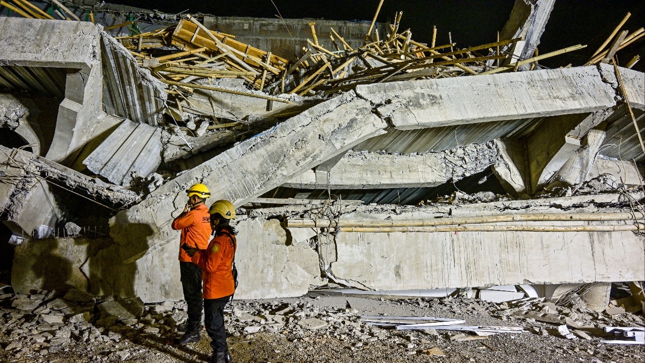 School auditorium building in Indonesia collapses, killing at least 1, injuring 83, fears children trapped under rubble