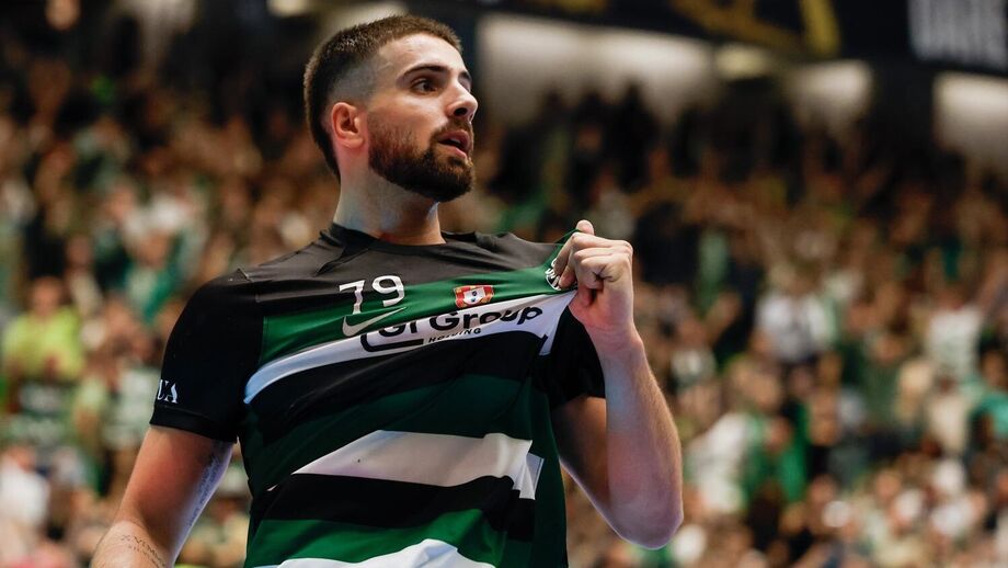 Sporting Extends Perfect Champions League Run With Kielce Win Athlete shows handball equipment with Portugal's symbol