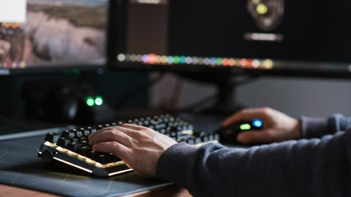 Gamer using a keyboard and mouse