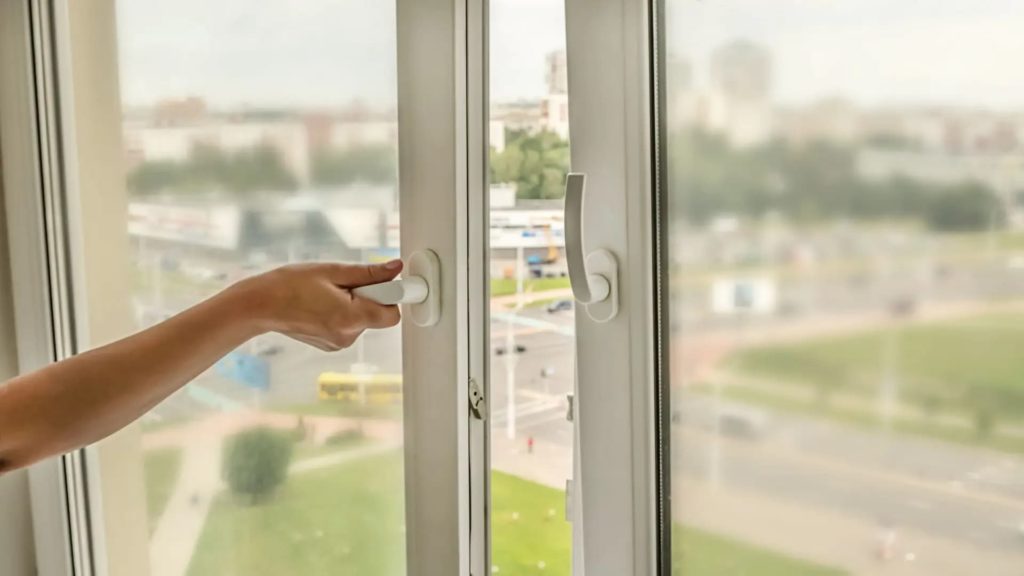 Chinese Invisible Solar Coating Transforms Windows into Power Generators A modern building with a facade of large, clear windows, illustrating the integration of invisible solar technology.