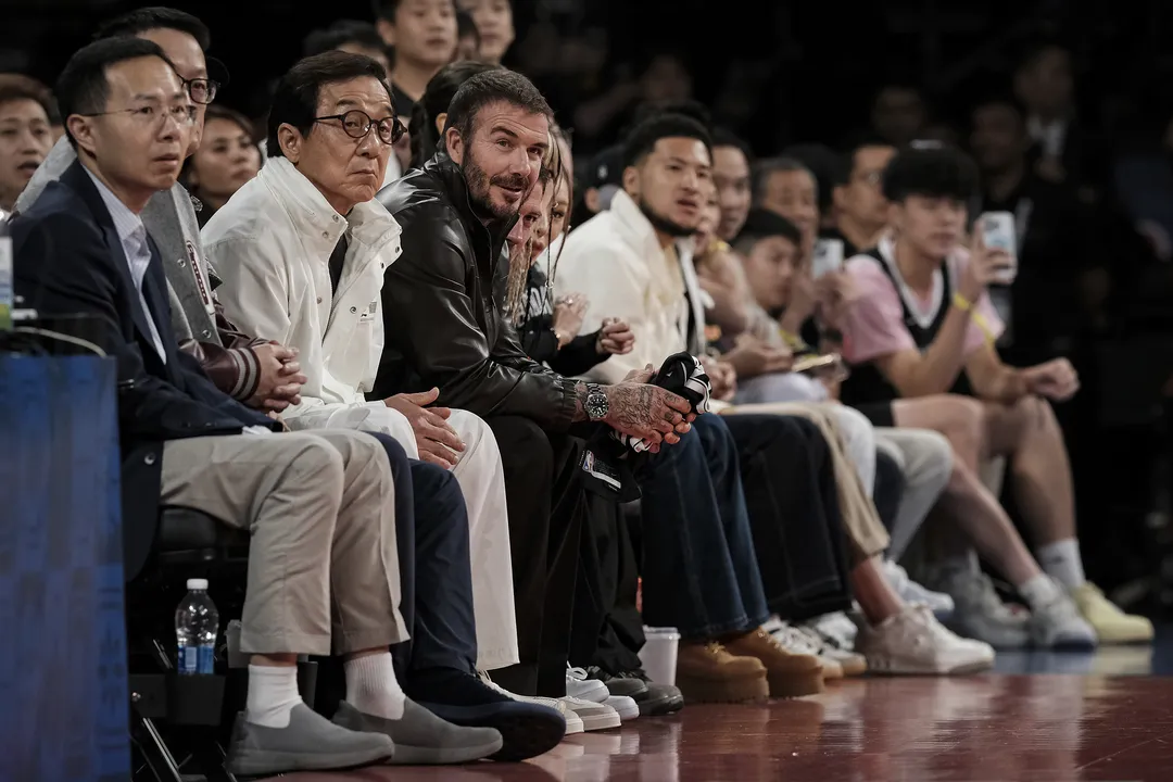 David Beckham and Jackie Chan watch the game