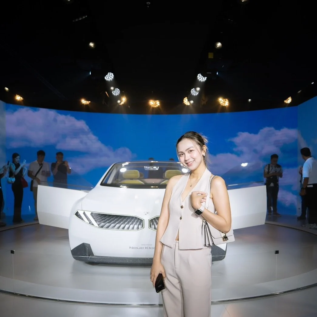 BMW Vision Neue Klasse Concept Unveils Electric, Sustainable Future Rear three-quarter view of the BMW Vision Neue Klasse, emphasizing its tail light design and sleek lines.