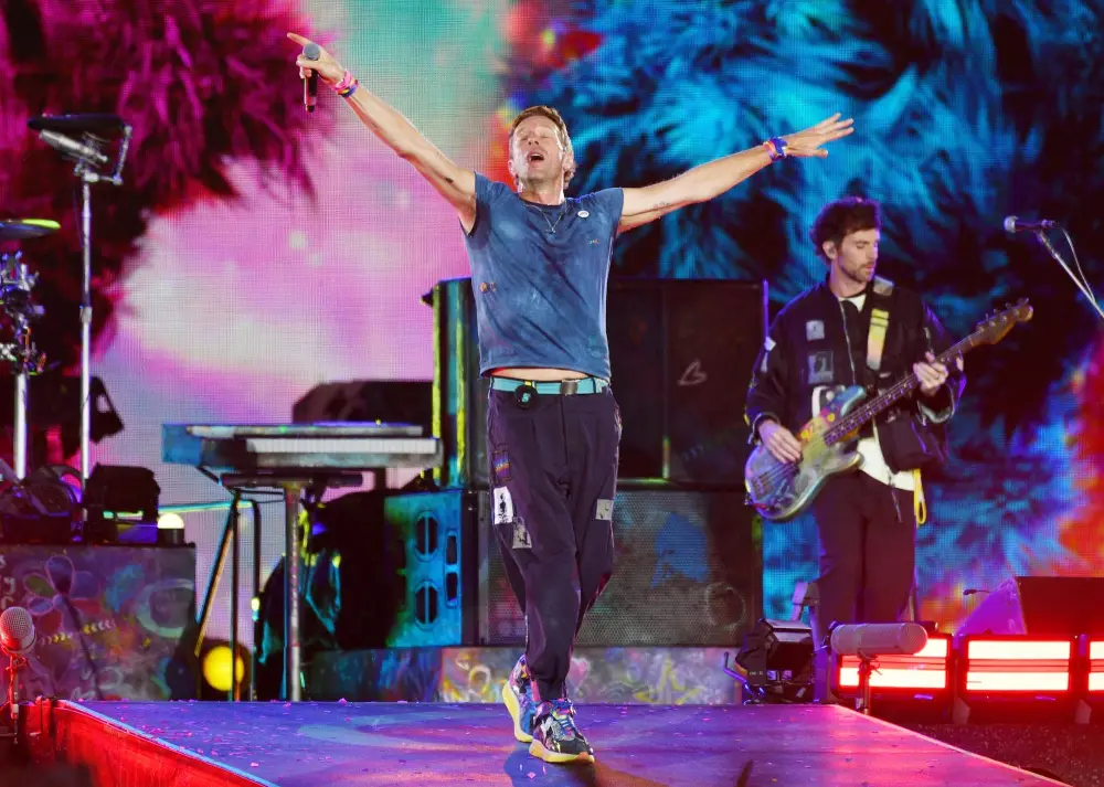 Chris Martin, lead singer of Coldplay, performs during the 'Music Of The Spheres World Tour' at Wembley Stadium.