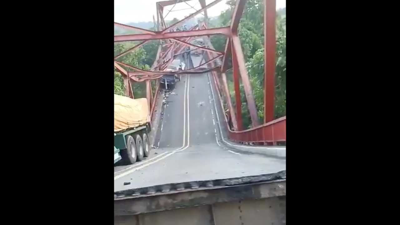 Philippines bridge collapses. Three heavy trucks on bridge at time of collapse.