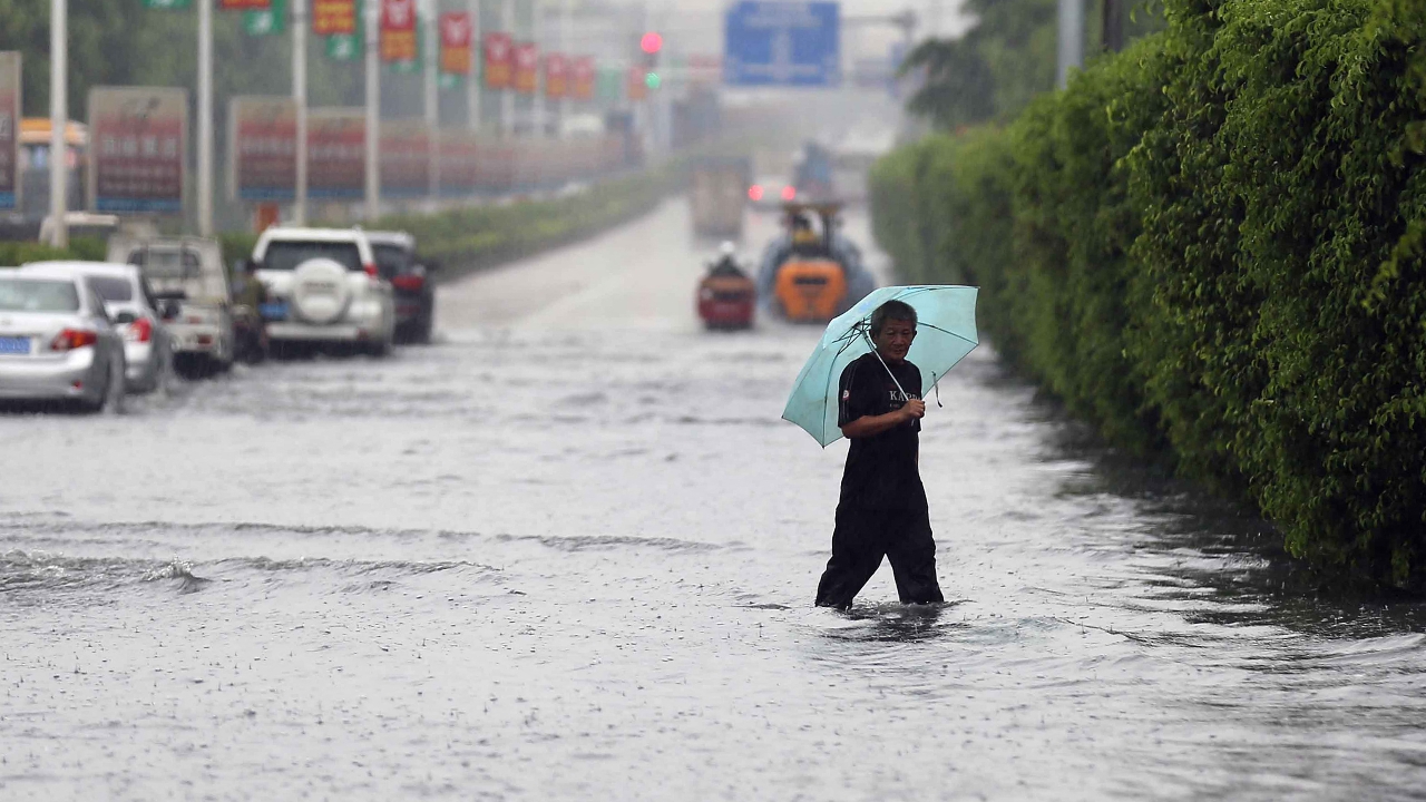 Typhoon "Matmo" makes landfall in Guangdong Province, southern China. Authorities order evacuation of over 400,000 people.